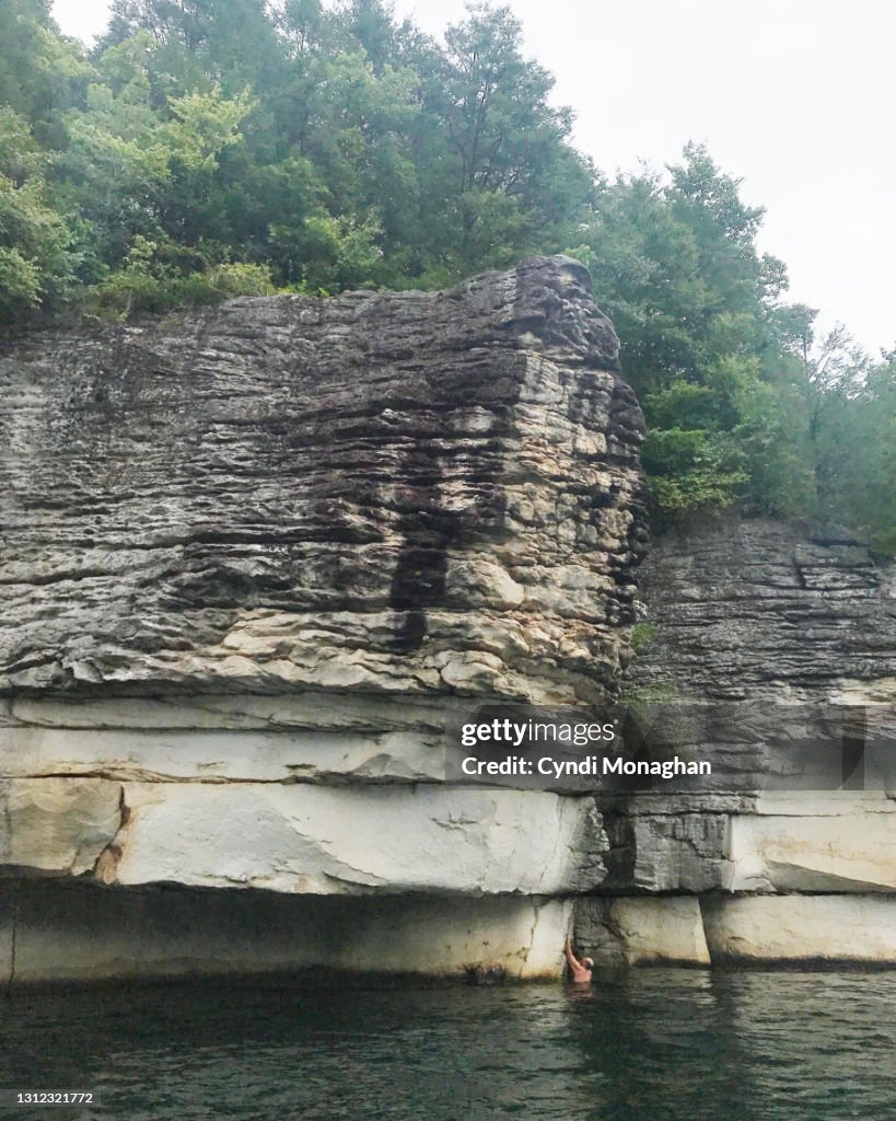 Man Rock Climbing at Summersville Lake