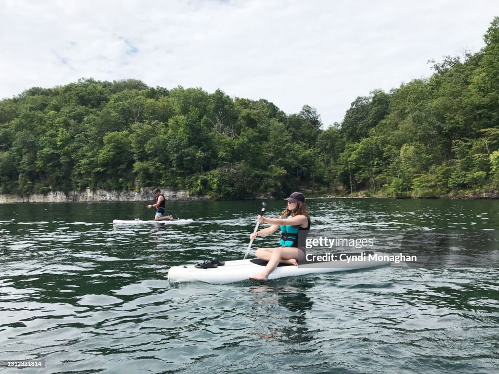 Dad and His Daughter Paddleboarding on Summersville Lake