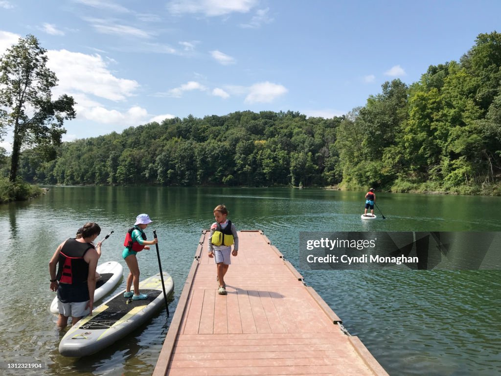 Family Preparing to Go Paddleboarding on Summersville Lake