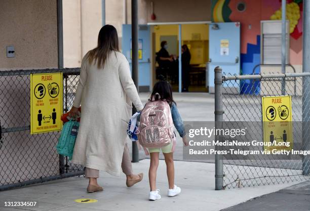 Student enters Heliotrope Avenue Elementary, in Maywood on Tuesday, April 13, 2021. Approximately 40% of elementary students enrolled in LAUSD are...