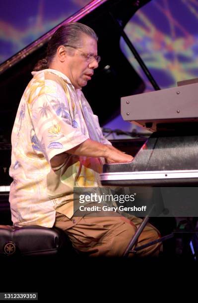 View of Jazz musician, composer, and bandleader Chick Corea plays electric piano as he performs onstage, with his Elektric Band, during a free...