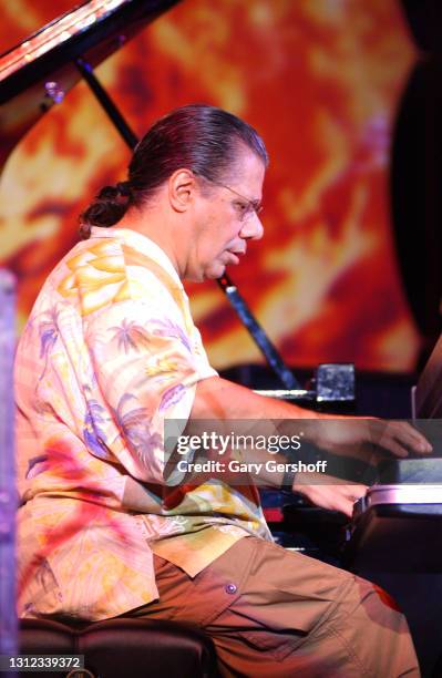 View of Jazz musician, composer, and bandleader Chick Corea plays electric piano as he performs onstage, with his Elektric Band, during a free...