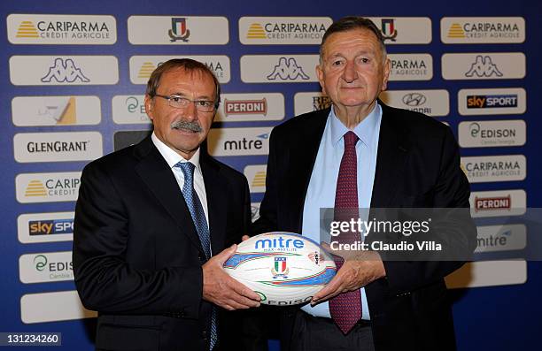 Italian Rugby's new coach Jacques Brunel and FIR president Giancarlo Dondi pose with a ball during Italian Rugby Federation Unveils New Coach Jacques...