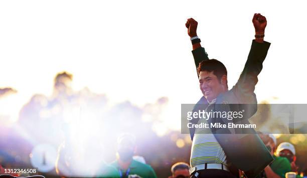Hideki Matsuyama of Japan celebrates during the Green Jacket Ceremony after winning the Masters at Augusta National Golf Club on April 11, 2021 in...