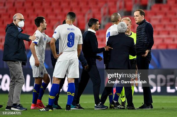 Thomas Tuchel, Manager of Chelsea and Sergio Conceicao, Head Coach of Porto interact following during the UEFA Champions League Quarter Final Second...