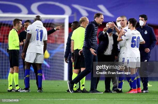 Pepe and Fabio Vieira of Porto react to Thomas Tuchel, Manager of Chelsea at full-time after the UEFA Champions League Quarter Final Second Leg match...