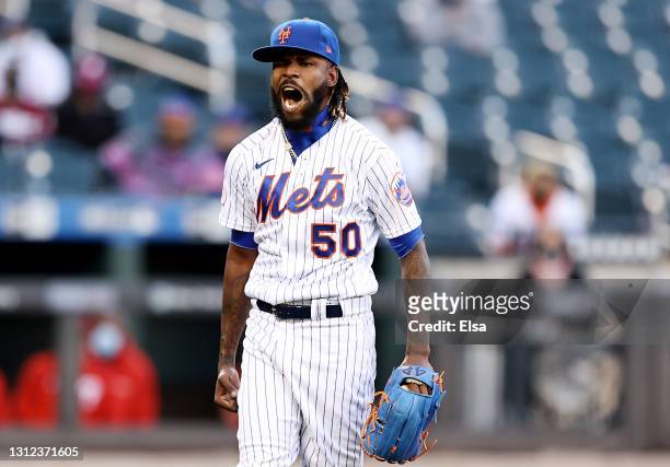 Miguel Castro of the New York Mets reacts after the final out of the sixth inning against the Philadelphia Phillies during game one of a double...
