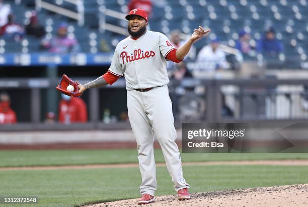 Jose Alvarado of the Philadelphia Phillies has words for the New York Mets bench after he hit Michael Conforto of the New York Mets with a pitch in...