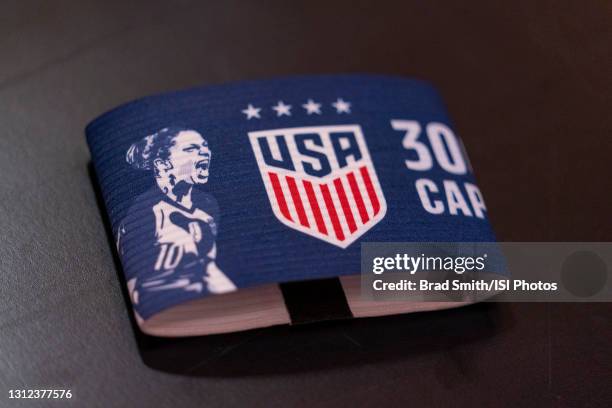 The captain’s armband of Carli Lloyd of the USWNT sits in the locker room before a game between Sweden and USWNT at Friends Arena on April 10, 2021...