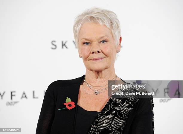 Dame Judi Dench attends a photocall with cast and filmmakers to mark the start of production which is due to commence on the 23rd Bond Film and...