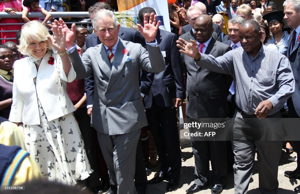 Britain's Prince Charles (2ndL) and his