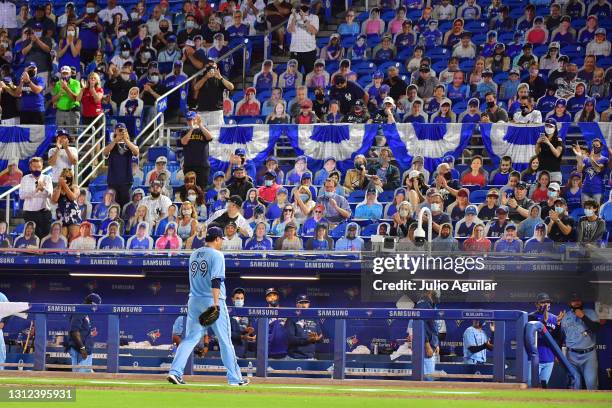 Hyun Jin Ryu of the Toronto Blue Jays walks off the field after being relieved in the seventh inning against the New York Yankees at TD Ballpark on...