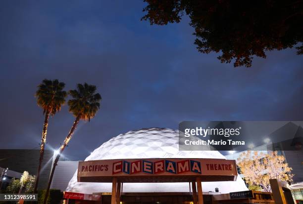 The famed Cinerama Dome is lit at dusk at the shuttered ArcLight Hollywood movie theater on April 13, 2021 in Los Angeles, California. Decurion, the...