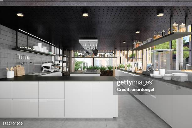 restaurant kitchen with white cabinets, kitchen island and kitchen utensils - restaurant kitchen stock pictures, royalty-free photos & images