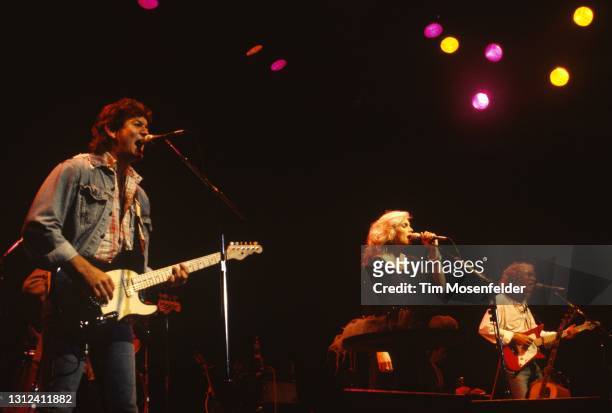 Rodney Crowell, Emmylou Harris and Albert Lee of the Hot Band perform at The Fillmore on April 3, 1995 in San Francisco, California.