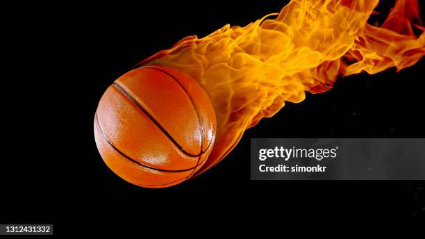 close-up of burning basketball - basketball close up stock pictures, royalty-free photos & images