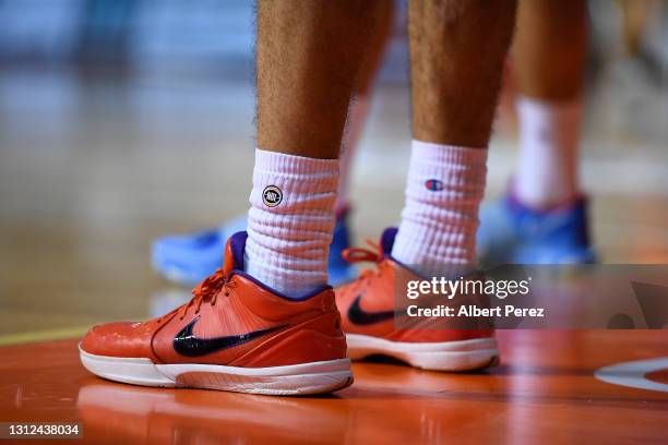 The shoes of Tad Dufelmeier of the 36ers are seen during the round 14 NBL match between the Cairns Taipans and the Adelaide 36ers at Cairns Pop Up...