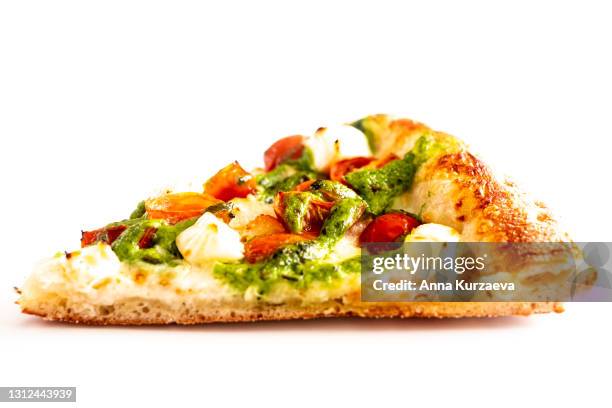 piece of pesto pizza isolated on white background - scheibe portion stock-fotos und bilder