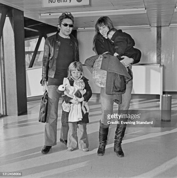 French musician and singer Serge Gainsbourg and his partner, English actress Jane Birkin with her daughter Kate Barry and their baby Charlotte...