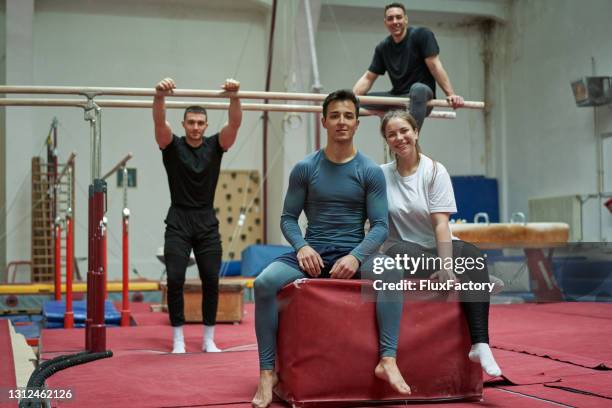 teamwork is what is most important in gymnastic - gymnastics stock pictures, royalty-free photos & images