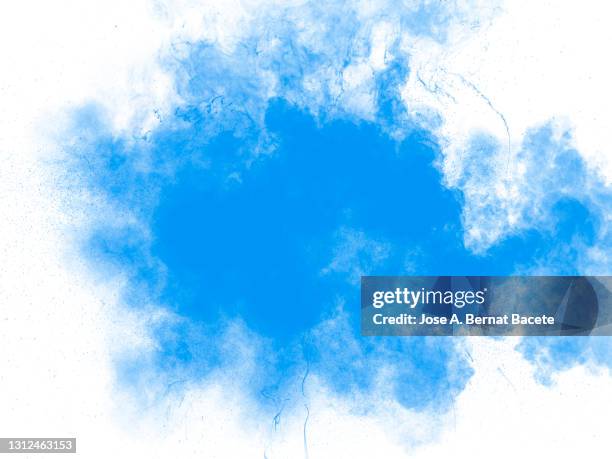 explosion with clouds of dust and blue smoke on a white background. - blue fog stock pictures, royalty-free photos & images