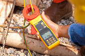 Measuring electric earthing ground resistance.