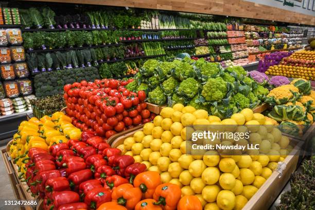 Vegetables are stacked neatly inside the produce area as employees prepare for the grand opening of Whole Foods Market in Commack, New York on April...