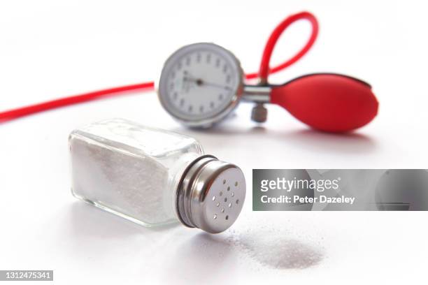 danger to health of excess salt - high blood pressure stockfoto's en -beelden