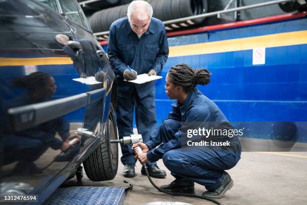 Auto Mechanics Students Work Photos and Premium High Res Pictures ...