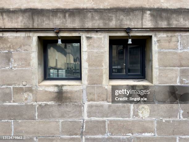 facade of the historical slaughterhouse in shanghai, china - 1933 stock-fotos und bilder