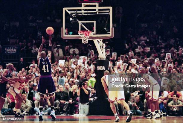 Glen Rice, Small Forward for the Charlotte Hornets shoots a free throw shot to the basket as Knicks fans try to put off his aim during Game 2 of the...