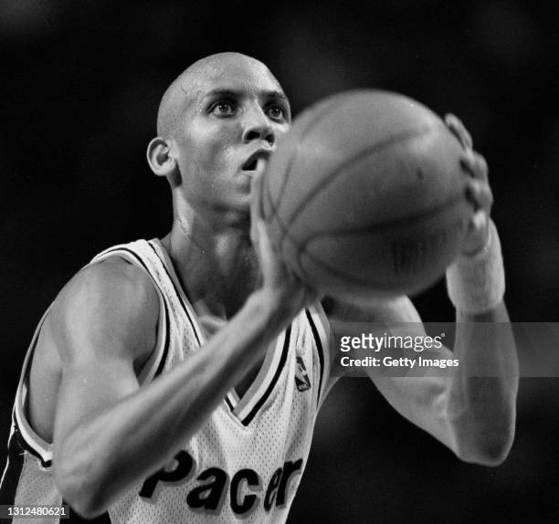 This image has been converted to black and white), Reggie Miller#31, Shooting Guard for the Indiana Pacers prepares to shoot a free throw during the...