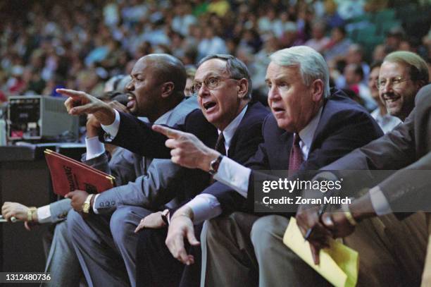 Larry Brown , Head Coach for the Indian Pacers and assistant coach Billy King holding the playbook call out instructions to their players during the...