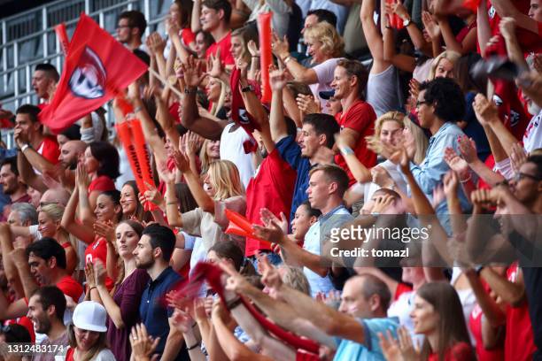 fans on the stadium cheering - crowd shouting stock pictures, royalty-free photos & images