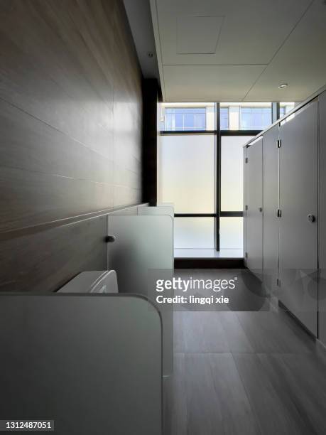 interior view of bathroom - office bathroom stock-fotos und bilder