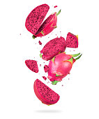Sliced ripe pitahaya in the air isolated  on a white background
