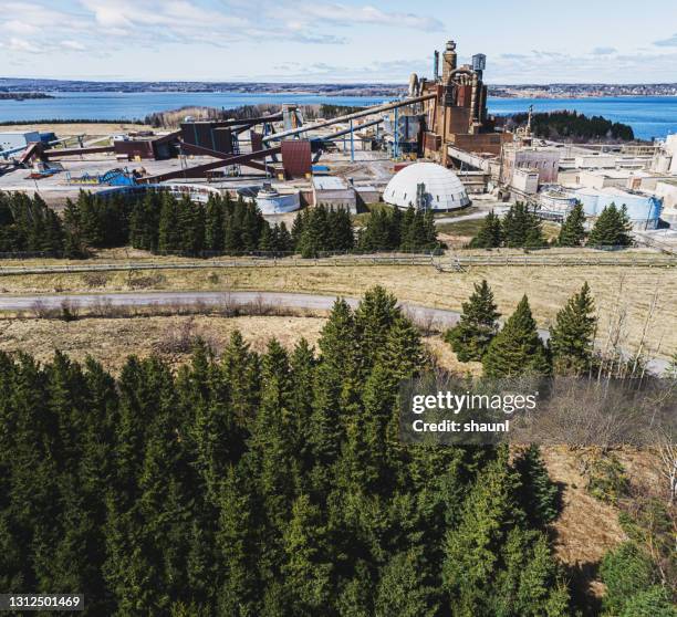 decommissioned pulp mill - logging mill stock pictures, royalty-free photos & images