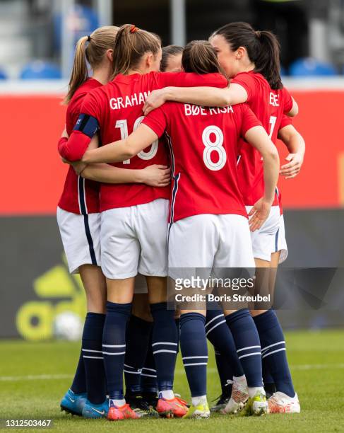 Guro Reiten of Norway celebrates with teammates after scoring her team's first goal during the Women's International Friendly match between Germany...