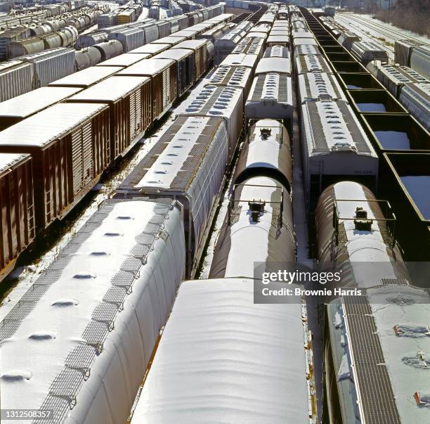 Freight cars parked in a snowy railyard, Erie, Pennsylvania, 1998.