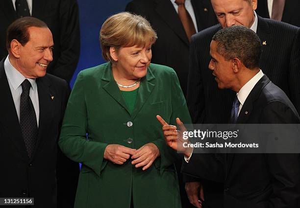 Italian Prime Minister Silvio Berlusconi, German Chancellor Angela Merkel, U.S.President Barack Obama and Turkish Prime Minister Tayyip Erdogan share...