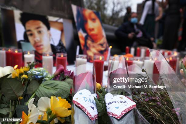 Flowers are seen in a makeshift memorial during a vigil for Daunte Wright and Dominique Lucious at Washington Square Park in Manhattan on April 14,...