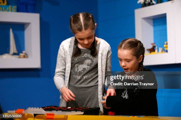 Blind and vision impaired children play with LEGO braille bricks for the first time at Legoland in Chadstone on April 15, 2021 in Melbourne,...