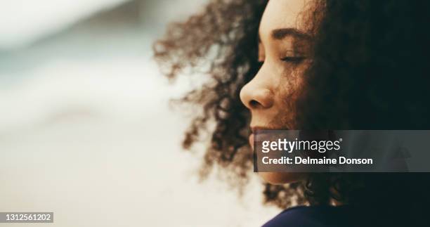 nothing makes me happier than smelling the ocean - african american women in the wind stock pictures, royalty-free photos & images