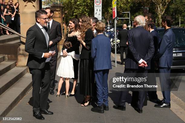 Bianca Spender and Allegra Spender, daughters of Carla Zampatti, are seen with family following the State Funeral for Carla Zampatti at St Mary's...