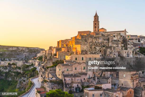 historic city of matera at sunrise, basilicata, italy - matera stockfoto's en -beelden