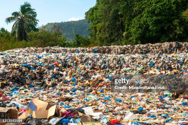 open-air sweepers dump in the seychelles - landfill stock pictures, royalty-free photos & images
