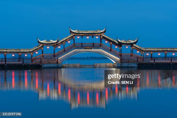 landscapes of the ancient buildings in jinxi at night,  a historic canal town in southwest kunshan, jiangsu province, china - suzhou china fotografías e imágenes de stock