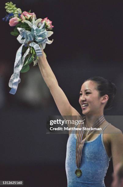 Michelle Kwan of the United States celebrates winning the gold medal in the Ladies Figure Skating Singles competition during the ISU World Figure...