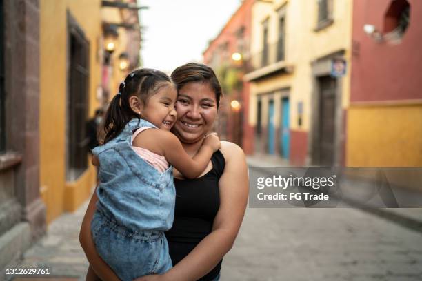 portrait of mother and daughter outdoors - méxico stock pictures, royalty-free photos & images