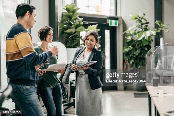 financial advisor  on the meeting with new bank  customers - employee engagement stock pictures, royalty-free photos & images